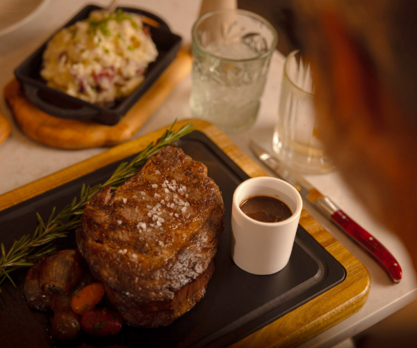 A photo of a steak prepared in-house at RARE 1981 at Saddlebrook